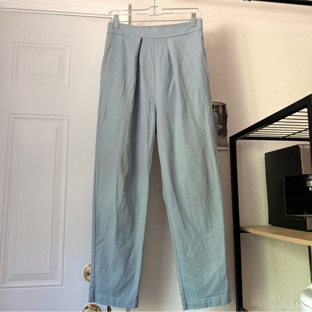 MIEN dusty denim blue high rise pleated front cropped tapered straight leg pants